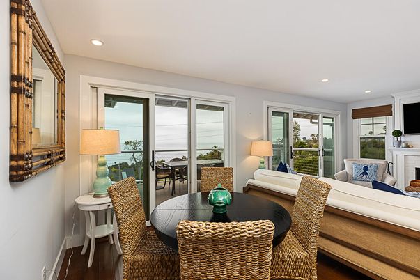 Dining room, Fireplace, Interior, Living room, Recessed Lighting, Water, Wood Texture Flooring