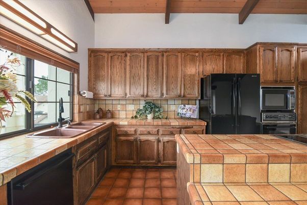 Interior, Kitchen, Tile Countertops, Wooden Beams