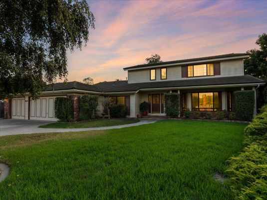 Attached, Backyard, Exterior, Facade, Brick Facade, Mediterranean