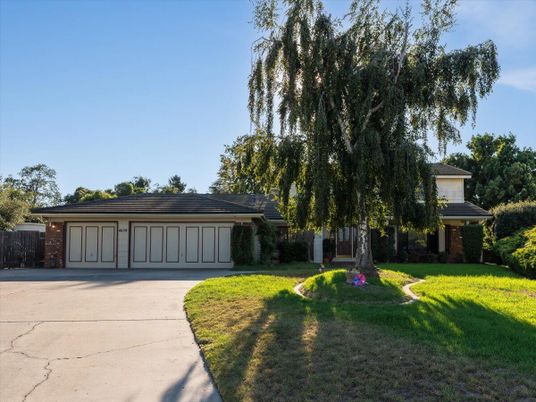 Attached, Backyard, Exterior, Facade, Brick Facade, Ranch
