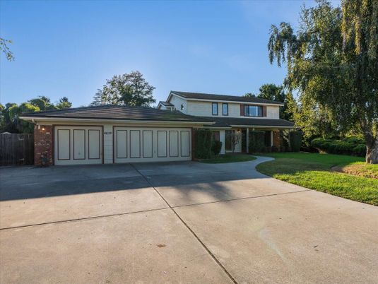 Attached, Backyard, Exterior, Facade, Brick Facade, Split Level