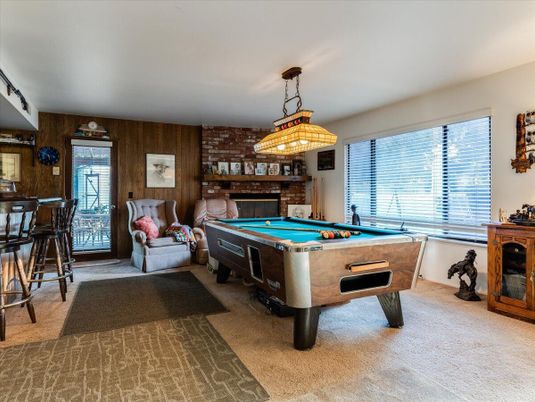 Billiard Table, Fireplace, Game Room, Interior, Pendant Lights, Stone Walls, Wooden Walls