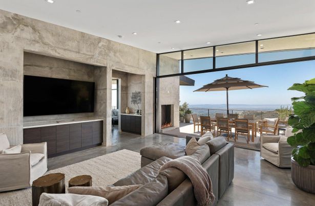 Dining room, Fireplace, Interior, Living room, Recessed Lighting, Stone Walls, Water