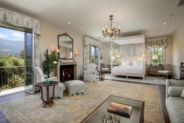 Bedroom, Chandelier, Fireplace, Interior, Recessed Lighting, Wood Texture Flooring