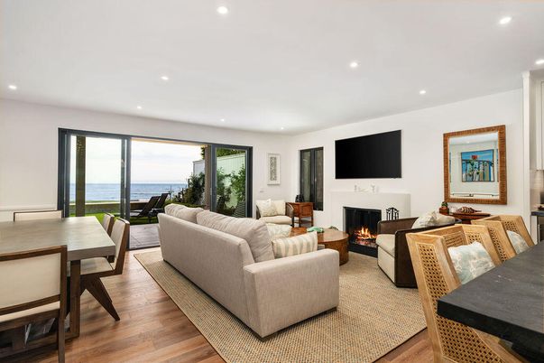 Dining room, Fireplace, Interior, Living room, Recessed Lighting, Water, Wood Texture Flooring