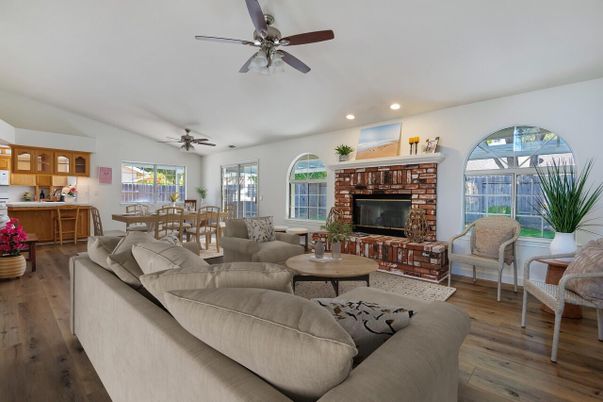 Dining room, Fireplace, Interior, Living room, Recessed Lighting, Wood Texture Flooring