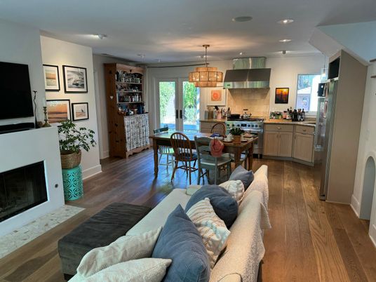 Chandelier, Dining room, Fireplace, Interior, Kitchen, Living room, Recessed Lighting, Stainless Steel Appliances, Wood Texture Flooring