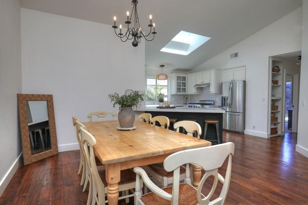 Chandelier, Dining room, Interior, Kitchen, Pendant Lights, Stainless Steel Appliances, Wood Texture Flooring