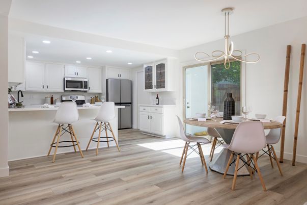 Dining room, Interior, Kitchen, Pendant Lights, Recessed Lighting, Stainless Steel Appliances, Wood Texture Flooring