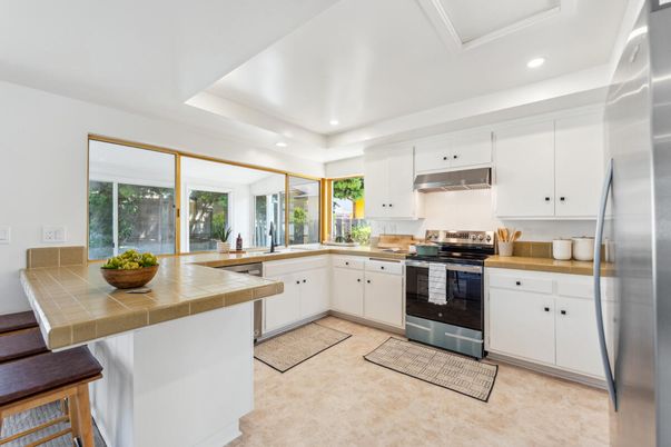 Interior, Kitchen, Recessed Lighting, Stainless Steel Appliances, Tile Countertops