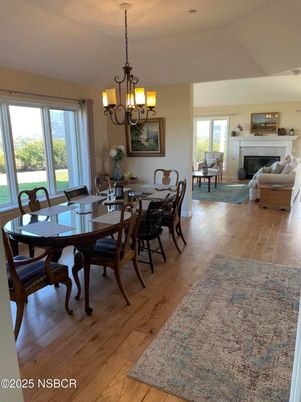 Chandelier, Dining room, Fireplace, Interior, Living room, Wood Texture Flooring