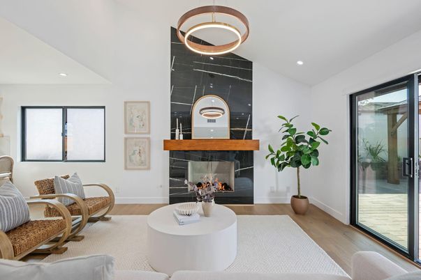 Fireplace, Interior, Living room, Marble Walls, Pendant Lights, Recessed Lighting, Wood Texture Flooring