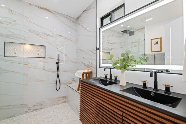 Bathroom, Dual Sink Vanities, Glass Shower, Interior, Marble Walls, Recessed Lighting