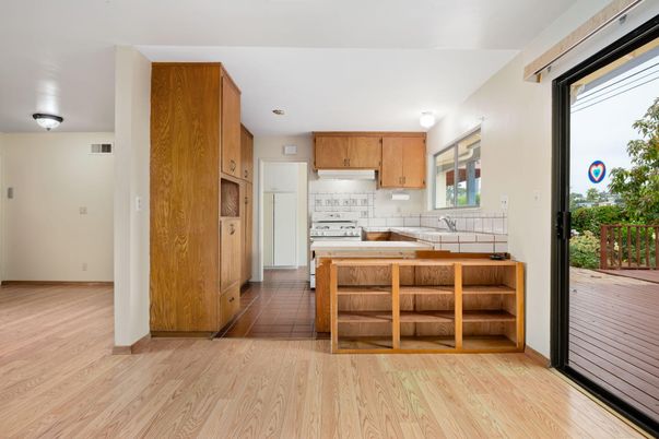 Interior, Kitchen, Tile Countertops, Wood Texture Flooring