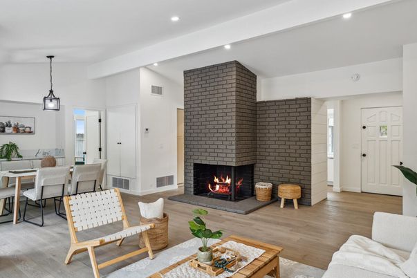 Dining room, Fireplace, Interior, Living room, Pendant Lights, Recessed Lighting, Stone Walls, Wood Texture Flooring