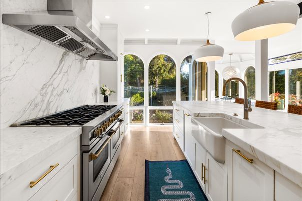 Interior, Kitchen, Marble Walls, Pendant Lights, Recessed Lighting, Stainless Steel Appliances, Wood Texture Flooring