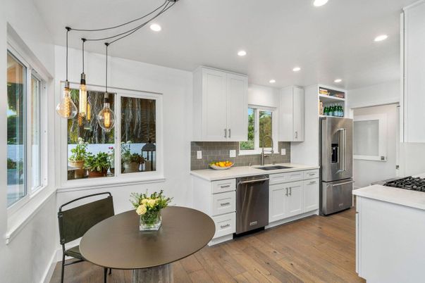 Dining room, Interior, Kitchen, Pendant Lights, Recessed Lighting, Stainless Steel Appliances, Wood Texture Flooring
