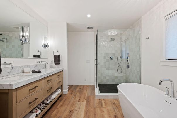 Bathroom, Dual Sink Vanities, Free Standing Baths, Glass Shower, Interior, Recessed Lighting, Wood Texture Flooring