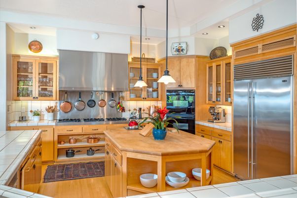 Interior, Kitchen, Pendant Lights, Recessed Lighting, Stainless Steel Appliances, Tile Countertops, Wood Texture Flooring