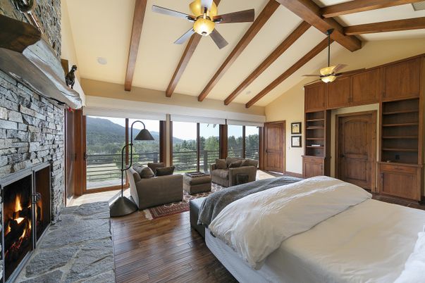 Bedroom, Fireplace, Interior, Recessed Lighting, Stone Walls, Wooden Beams, Wood Texture Flooring