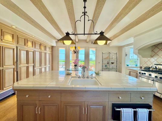 Interior, Kitchen, Pendant Lights, Recessed Lighting, Stainless Steel Appliances, Tile Countertops, Wooden Beams, Wood Texture Flooring