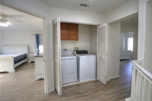 Bedroom, Interior, Utility Closets, Washer, Wood Texture Flooring