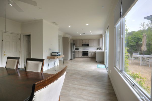 Dining room, Interior, Kitchen, Recessed Lighting, Stainless Steel Appliances, Wood Texture Flooring
