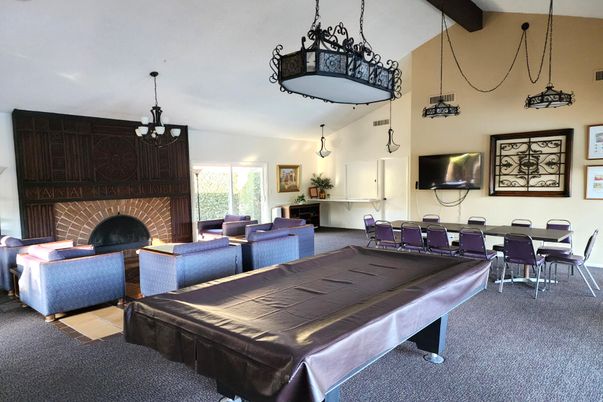 Billiard Table, Chandelier, Dining room, Fireplace, Game Room, Interior, Living room, Pendant Lights