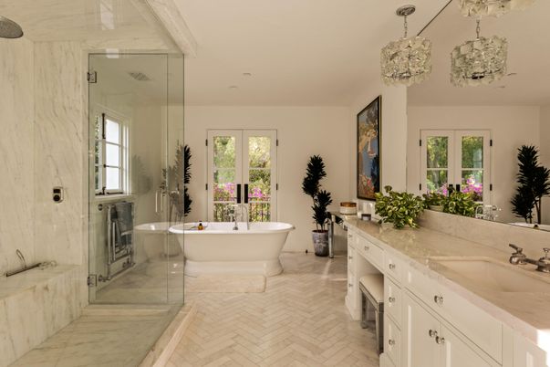 Bathroom, Chandelier, Dual Sink Vanities, Free Standing Baths, Interior, Marble Walls, Pendant Lights, Recessed Lighting