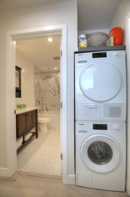 Bathroom, Interior, Marble Walls, Recessed Lighting, Utility Closets, Washer