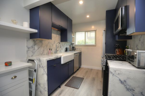 Interior, Kitchen, Marble Walls, Recessed Lighting, Wood Texture Flooring