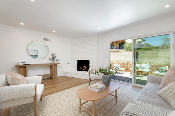 Fireplace, Interior, Living room, Recessed Lighting, Stone Walls, Wood Texture Flooring
