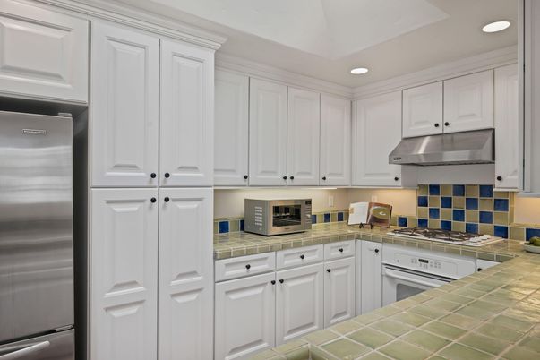 Interior, Kitchen, Recessed Lighting, Stainless Steel Appliances, Tile Countertops