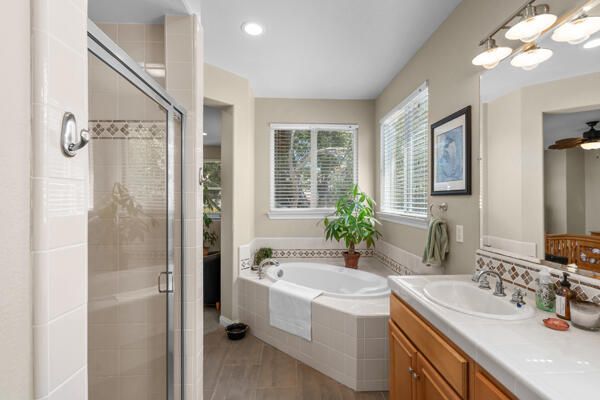 Bathroom, Glass Shower, Interior, Recessed Lighting, Tile Countertops, Wood Texture Flooring