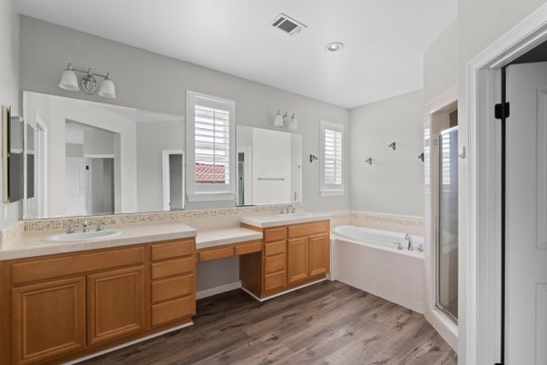 Bathroom, Dual Sink Vanities, Interior, Recessed Lighting, Tile Countertops, Wood Texture Flooring