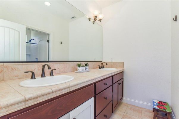 Bathroom, Dual Sink Vanities, Interior, Recessed Lighting, Tile Countertops