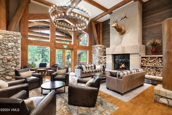 Chandelier, Fireplace, Interior, Living room, Pendant Lights, Stone Walls, Wooden Beams, Wood Texture Flooring, Wooden Walls