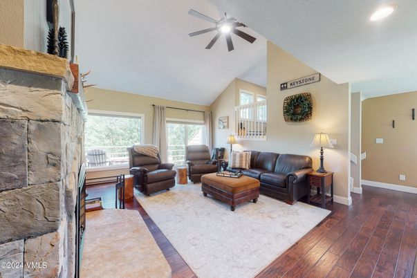 Fireplace, Interior, Living room, Recessed Lighting, Stone Walls, Wood Texture Flooring