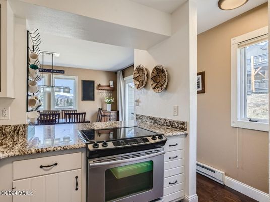 Dining room, Interior, Kitchen, Pendant Lights, Stainless Steel Appliances, Wood Texture Flooring