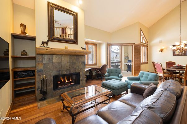 Chandelier, Dining room, Fireplace, Interior, Living room, Wood Texture Flooring