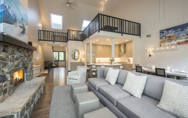 Dining room, Fireplace, Interior, Living room, Pendant Lights, Recessed Lighting, Wood Texture Flooring