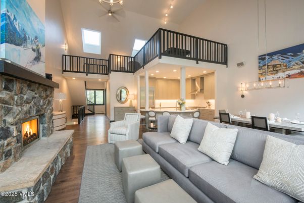 Dining room, Fireplace, Interior, Living room, Pendant Lights, Recessed Lighting, Wood Texture Flooring
