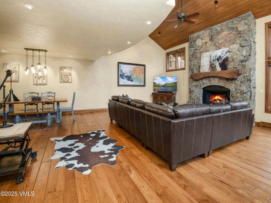 Dining room, Fireplace, Interior, Living room, Pendant Lights, Recessed Lighting, Stone Walls, Wood Texture Flooring