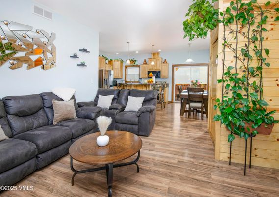 Dining room, Interior, Kitchen, Living room, Pendant Lights, Recessed Lighting, Wood Texture Flooring