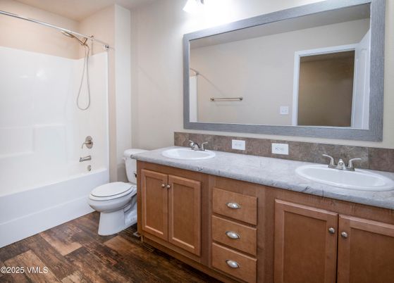 Bathroom, Dual Sink Vanities, Interior, Tile Countertops, Wood Texture Flooring