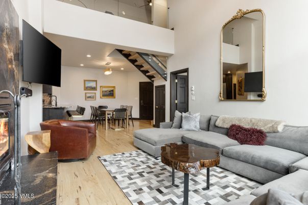 Dining room, Fireplace, Interior, Living room, Recessed Lighting, Wood Texture Flooring