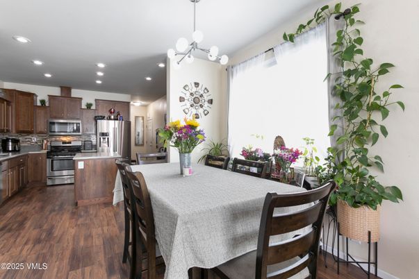 Dining room, Interior, Kitchen, Pendant Lights, Recessed Lighting, Stainless Steel Appliances, Wood Texture Flooring