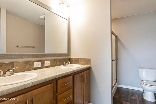 Bathroom, Dual Sink Vanities, Interior, Tile Countertops, Wood Texture Flooring