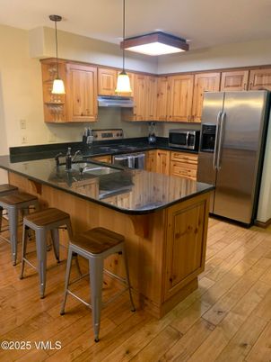 Interior, Kitchen, Pendant Lights, Stainless Steel Appliances, Wood Texture Flooring
