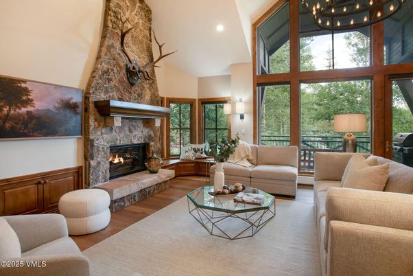 Fireplace, Interior, Living room, Recessed Lighting, Stone Walls, Wood Texture Flooring